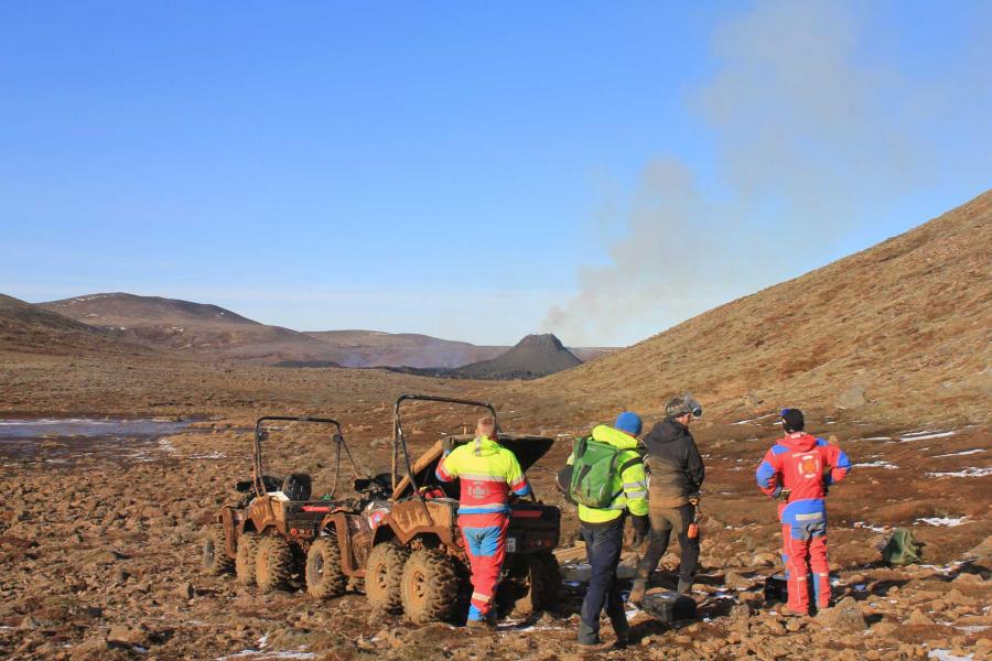 a team of researchers unpack equipment from ATVs near the Fagradalsfjall eruption.